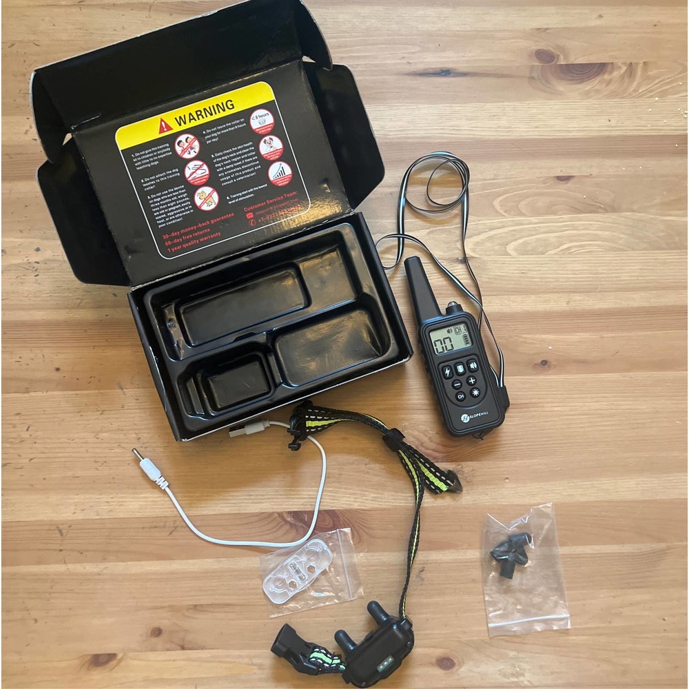 Dog obedience collar shock vibration sound shock turn off button.